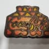 Vintage Coca Cola Cast Iron Trivet Wall Hanger for sale