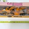 New-Ray Construction Series Peterbilt 379 with Cat Excavator 1:32 scale toy model for sale