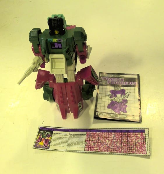 Comes with these part for 1987 Hasbro Transformer Decepticon SkullCruncher for sale on heinventures.ca