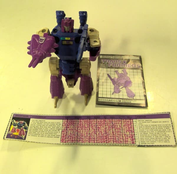 Comes with Hasbro Transformers Decepticon Squeezeplay Crab Monster available on heinventures.ca