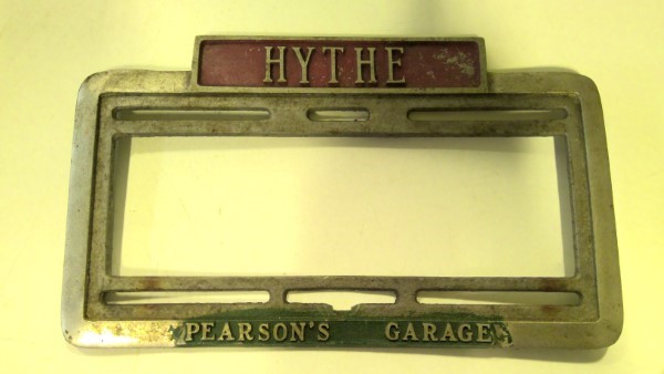 Vintage Hythe Alberta Pearson's Garage Embossed License Plate Frame for sale