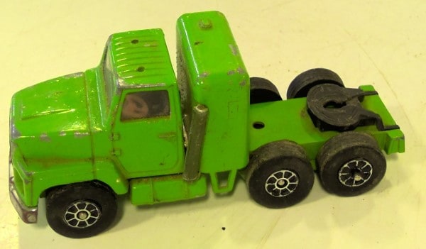 Vintage Green Playart Semi Truck Diecast for sale on heinventures.ca