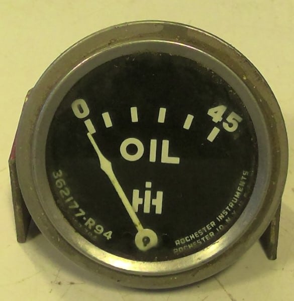 Vintage International Harvester Oil Pressure Gauge for sale on Hein Ventures' online antique and vintage store