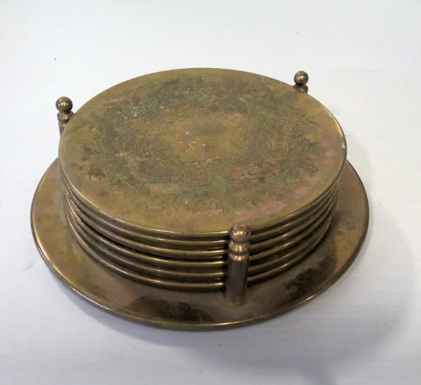 Set of 6 Brass Drink Coasters in Brass Holder. for sale