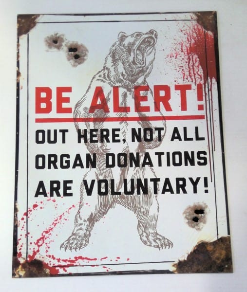 Be Alert! Out Here Not All Organ Donations are Voluntary! Novelty Tin Sign for sale