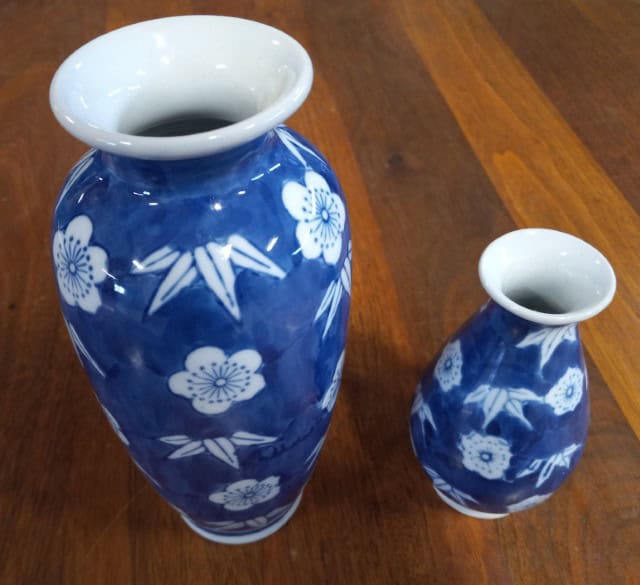 Lot of Two Blue and White Floral Vases for sale on heinventures.ca