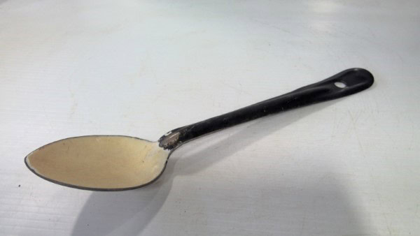 Vintage White and Black Enamel Serving Spoon for sale