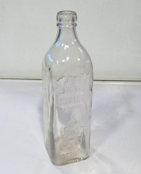 Vintage The Old Bushmills Distillery Embossed Bottle for sale