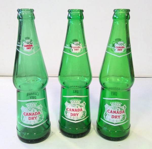 Vintage 1964 & 1968 Green Glass Canada Dry Bottles for sale