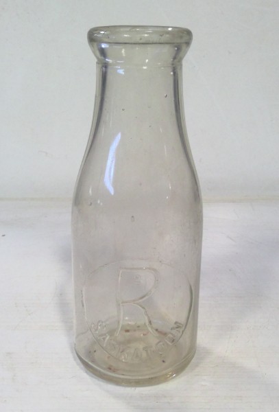 Antique R Saskatoon Saskatchewan Milk Bottle for sale
